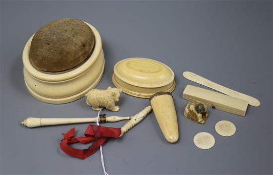 A collection of mixed ivory including a netsuke, pin tray and a cheroot holder